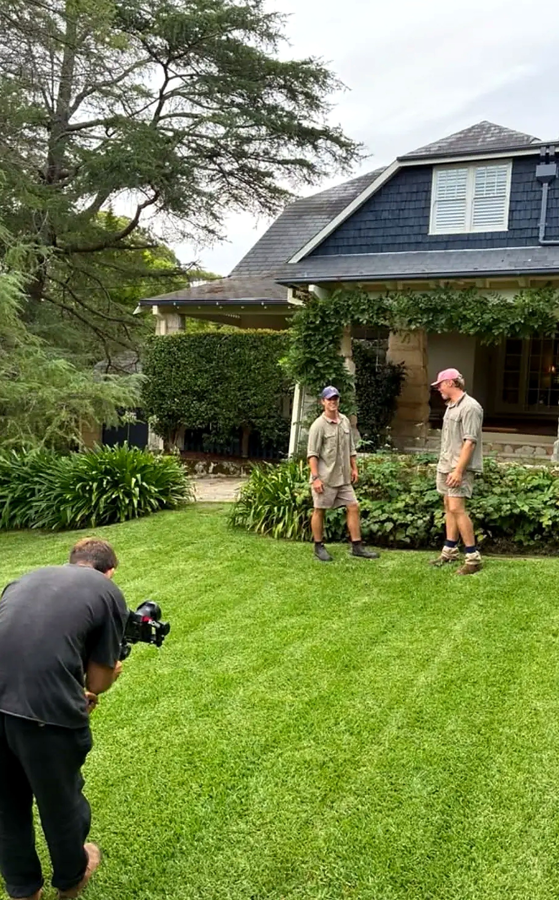 GOAT Gardens team on a freshly mown lawn during a shoot